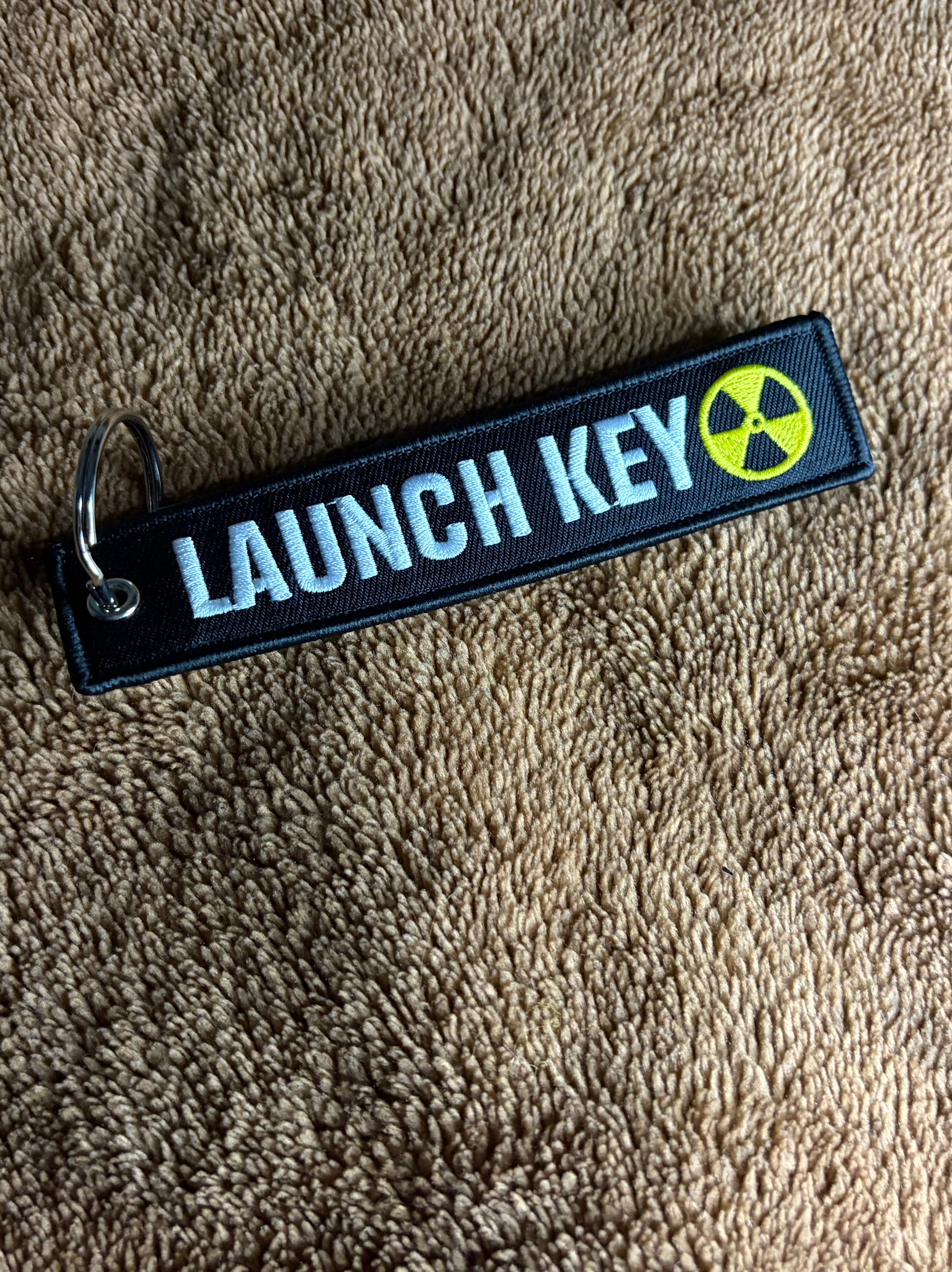 “Launch key” keychain